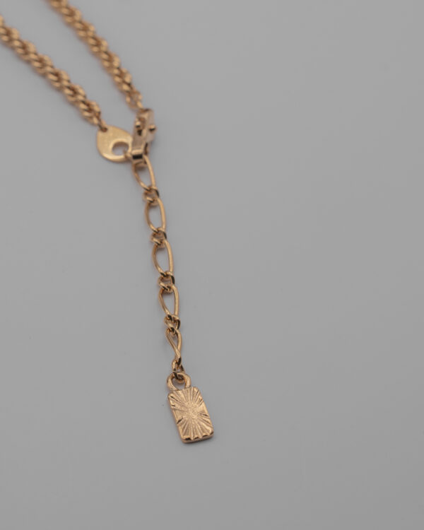 DSC_2416 Komplet Yves Saint Laurent – złote klipsy i naszyjnik