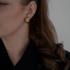 Klipsy Christian Dior - przeplatana forma
