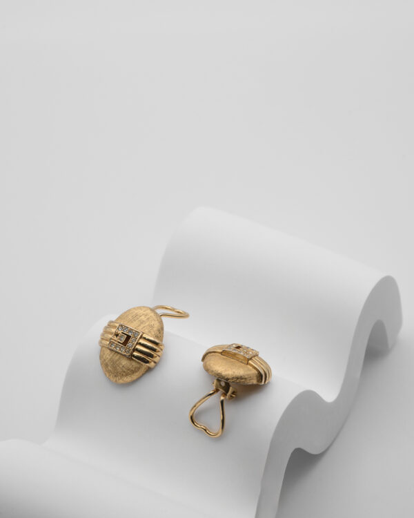 Klipsy Givenchy – złote owalne z geometrycznym detalem