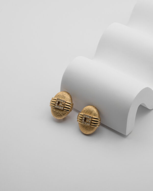 Klipsy Givenchy – złote owalne z geometrycznym detalem