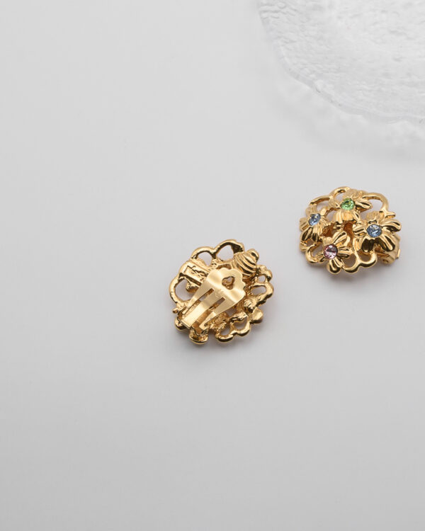 Klipsy Yves Saint Laurent – złote kwiaty z kryształami