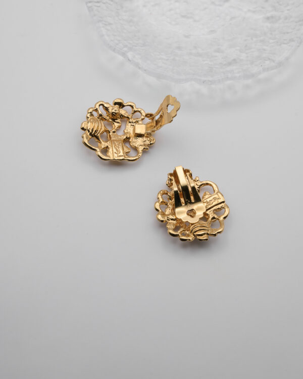 Klipsy Yves Saint Laurent – złote kwiaty z kryształami