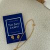 Komplet Yves Saint Laurent – złote klipsy i naszyjnik