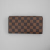 Portfel Louis Vuitton Damier Ebene – klasyczna szachownica i złote zapięcie