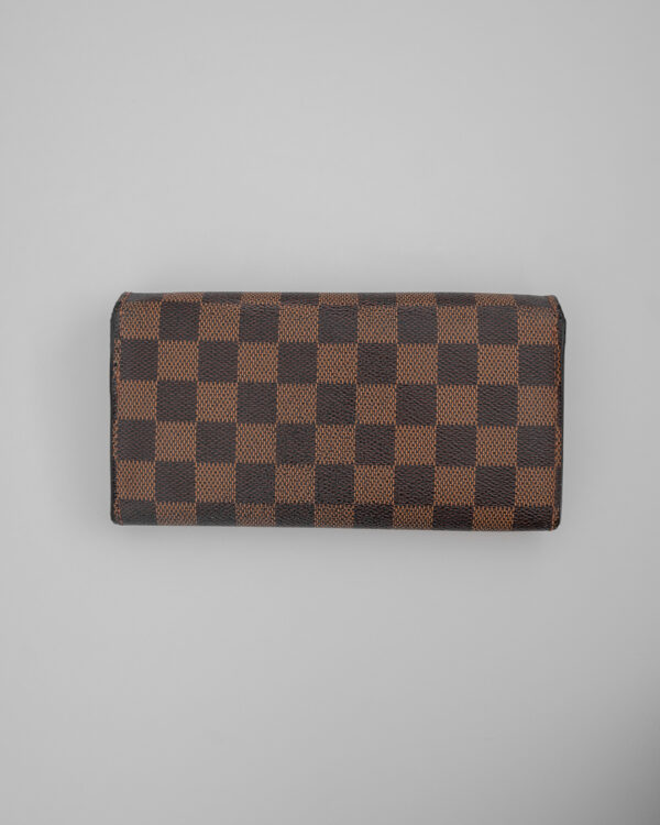Portfel Louis Vuitton Damier Ebene – klasyczna szachownica i złote zapięcie