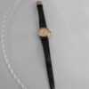 Omega Genève – klasyczny zegarek szwajcarski w złotej tonacji, lata 60./70.