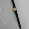 Omega Genève – klasyczny zegarek szwajcarski w złotej tonacji, lata 60./70.