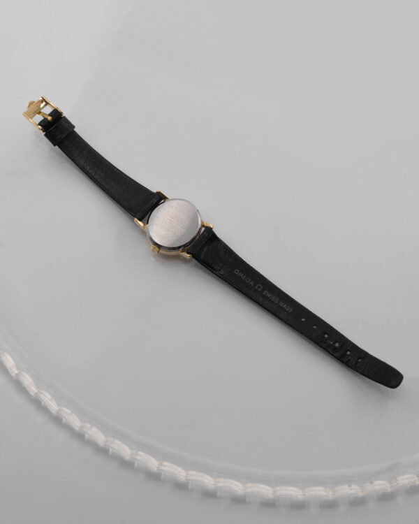 Omega Genève – klasyczny zegarek szwajcarski w złotej tonacji, lata 60./70.