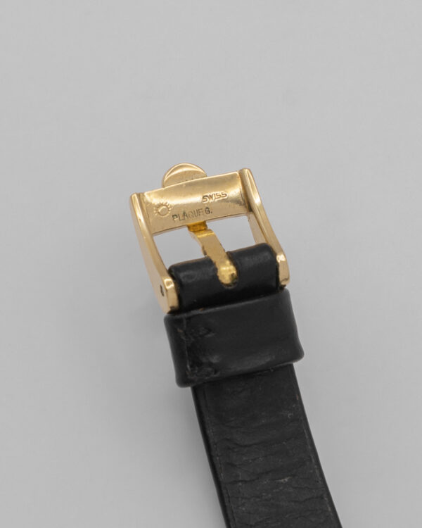 Omega Genève – klasyczny zegarek szwajcarski w złotej tonacji, lata 60./70.