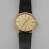 Omega Genève – klasyczny zegarek szwajcarski w złotej tonacji, lata 60./70.