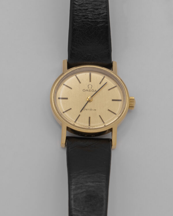 Omega Genève – klasyczny zegarek szwajcarski w złotej tonacji, lata 60./70.