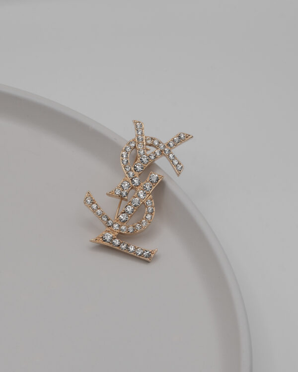 Broszka Yves Saint Laurent - duża broszka logo YSL wysadzana kryształkami, lata 80./90.