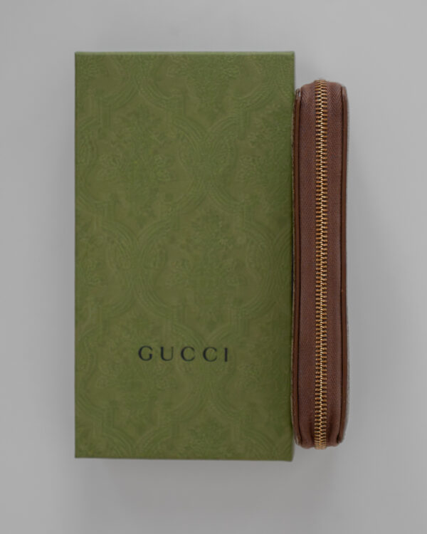 Portfel Gucci GG Supreme z kultowym monogramem
