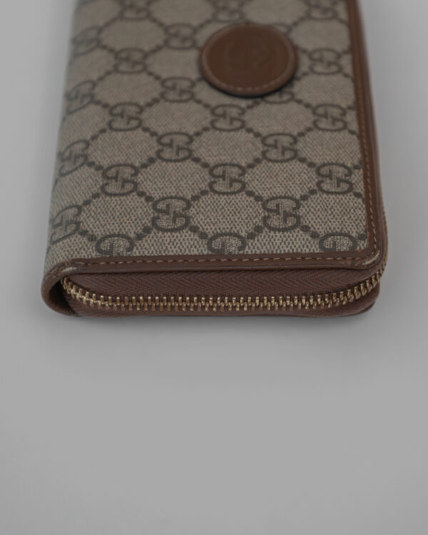 Portfel Gucci GG Supreme z kultowym monogramem