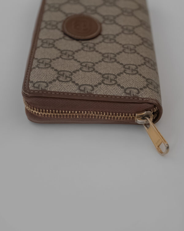 Portfel Gucci GG Supreme z kultowym monogramem