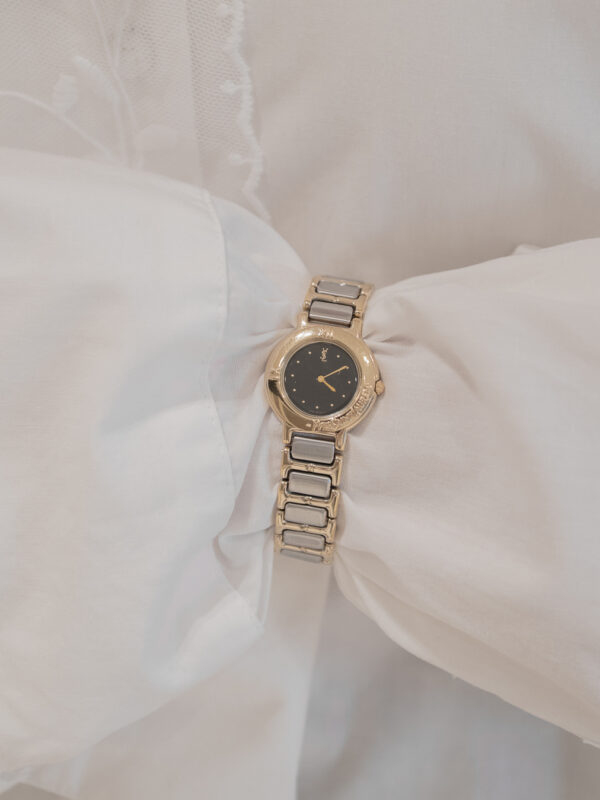 Zegarek Yves Saint Laurent Arty bicolor – złota koperta z czarną tarczą, Swiss Made, lata 90.
