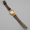Zegarek Gucci Horsebit Swiss Made - pozłacany zegarek z czarną tarczą i skórzanym paskiem, lata 80./90.