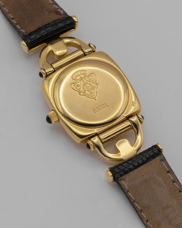 Zegarek Gucci Horsebit Swiss Made - pozłacany zegarek z czarną tarczą i skórzanym paskiem, lata 80./90.