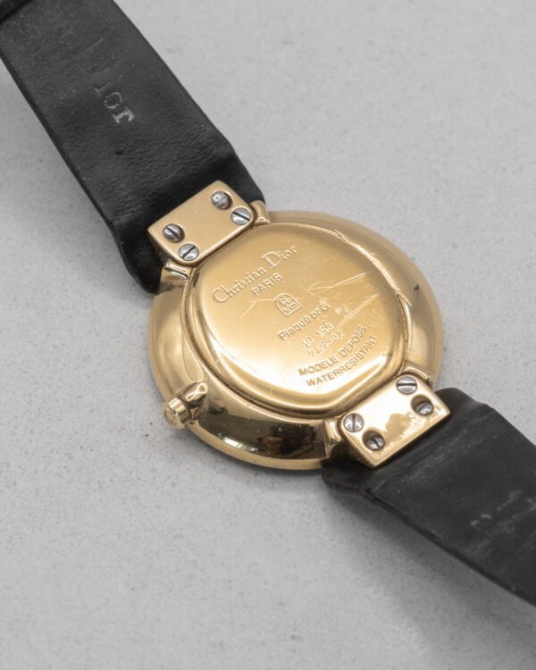 Zegarek Christian Dior - czarna minimalistyczna tarcza ze złotymi detalami