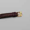 Zegarek Gucci 6000 Horsebit -  jasna koperta w złotej oprawie na brązowym skórzanym pasku, lata 80./90.