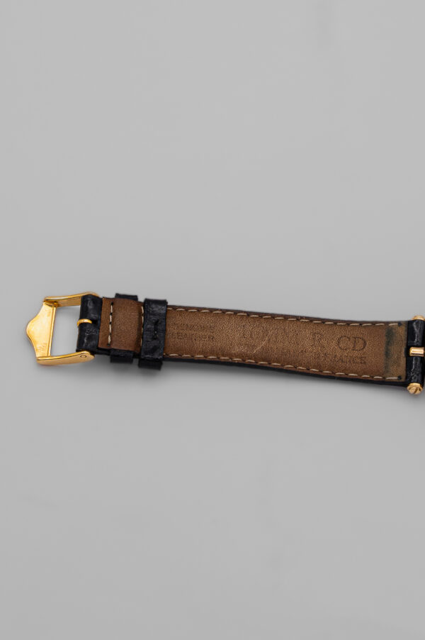Zegarek Gucci 3000 Series - elegancka złota koperta z czarną tarczą na skórzanym pasku, lata 80./90.
