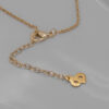 Naszyjnik Christian Dior z medalionem i złotym logo – lata 80./90.